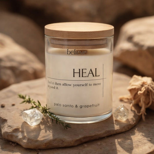 Natural wax luxury candle in Dubai HEAL with palo santo and grapefruit scent by BELIEVE