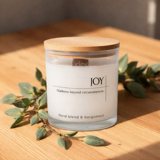 Natural wax luxury candle in Dubai JOY with floral and bergamot fragrance by BELIEVE